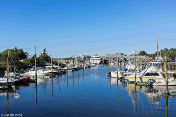 Photograph of barnstable harbor and millway marina with boats in slips