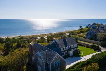 Photograph of a home in Harwich Port on Cape Cod with a view of the ocean