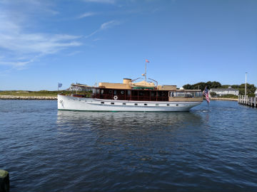 Photograph of a Classic yacht at Falmouth Harbor enterance