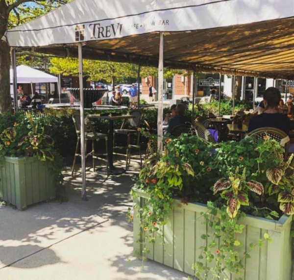 Photograph of the outside dining under a tent at Trevi Cafe and Wine Bar in Masphee, MA